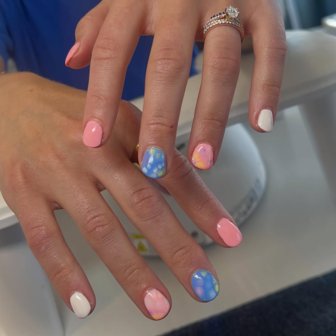 Pastel pink, white, and blue floral nail set